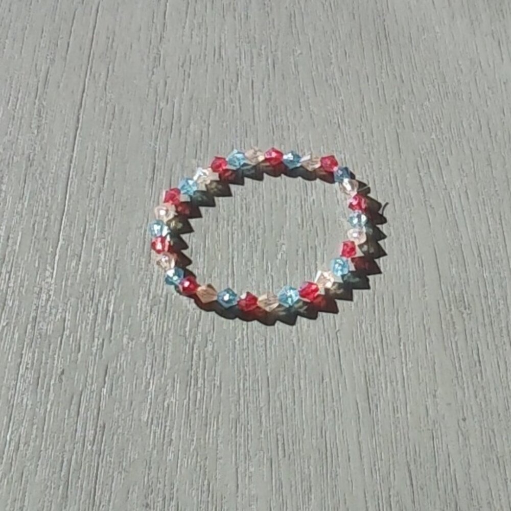 handmade red, bule and a cream white braclet